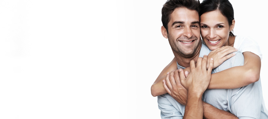 Woman hugs a man. They are smile